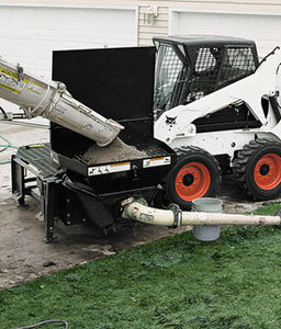 pompa per calcestruzzo per minipala caricatrice / per cantiere