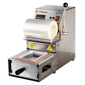 termosigillatrice di vaschette lineare