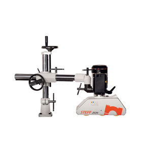 alimentatore a rulli