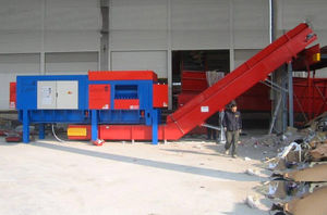 trituratore per rifiuti solidi sfusi / monoalbero / mobile / robusto