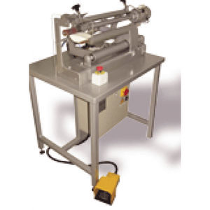 macchina di nobilitazione tessile per indumenti