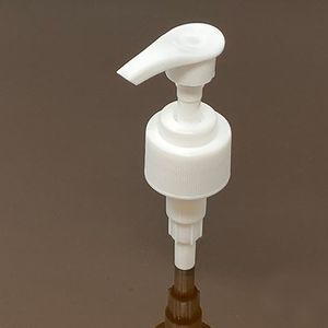 testa di tappatura per flaconi con pompetta manuale