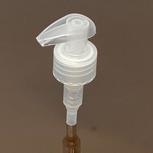 testa di tappatura per flaconi con pompetta manuale