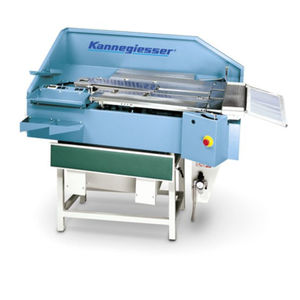 macchina piegatrice per tessuti