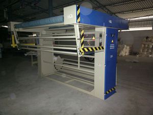 macchina piegatrice per tessuti