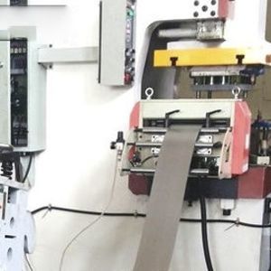alimentatore a rulli