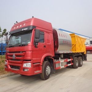 spanditrice per leganti montata su camion