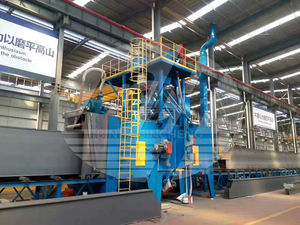 granigliatrice con nastro trasportatore a rulli 1