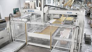 sistema di carico e scarico per alimentatore