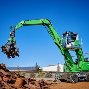 macchina di movimentazione materiali cingolata