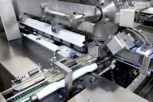sigillatrice per barattoli di latta automatica