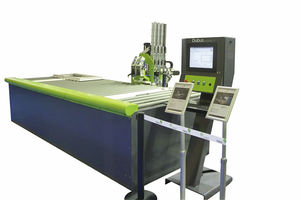 macchina per l'inserimento manuale