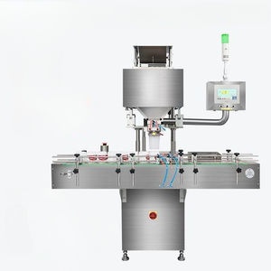 contapezzi e riempitrice per pacchi di bottiglie 1