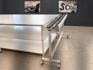 vaschetta a rulli per svolgimento di rotoli per materiale tessile