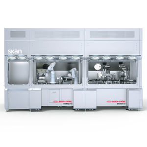 sistema di apertura di vaschette automatico