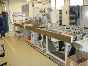 macchina di produzione per guanti monousi