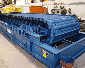 alimentatore grembiule