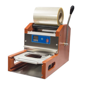 termosigillatrice di vaschette lineare
