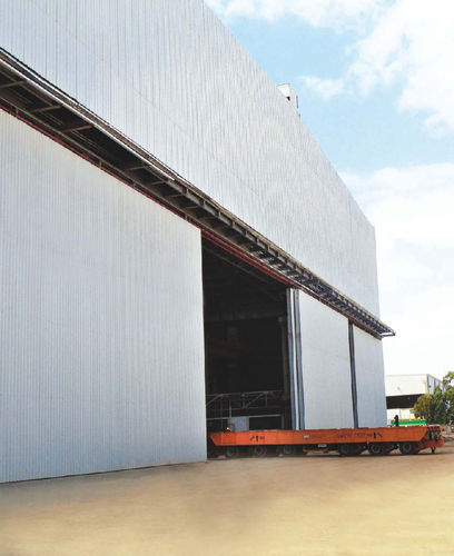 Porta scorrevole - Gandhi Automations Pvt Ltd - in acciaio / per hangar / industriale