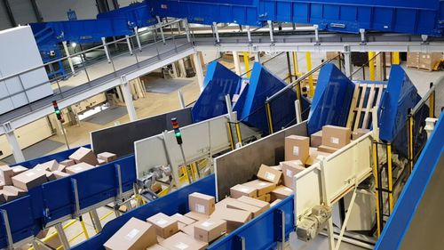 Sistema di scarico per pacchi - U-care P - ALFI TECHNOLOGIES - per pallet / automatico
