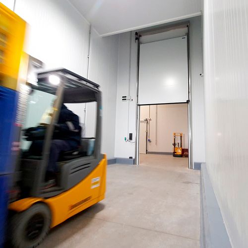 Porta scorrevole verticale - Infraca - in acciaio inossidabile / in alluminio anodizzato / per interno