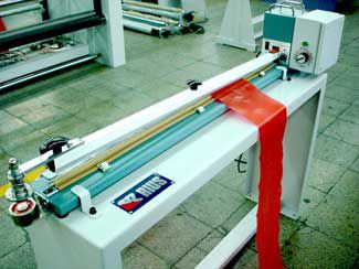 Sigillatrice automatica - SEAL-TA - RIUS-COMATEX - di film / con alimentatore / di taglio