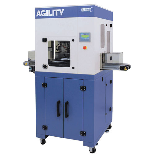 Sbloccatore per produzione di lenti oftalmiche automatico - Coburn Technologies