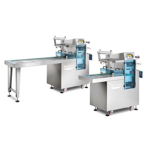 Termosigillatrice di vaschette lineare - TSB-AC series - TECNOTRIP - automatica / sottovuoto / per confezionamento in atmosfera modificata