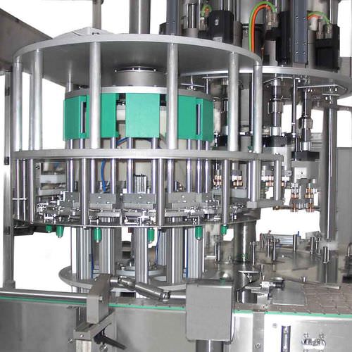 Tappatrice con avvitatore rotativa - APACKS - automatica / per bottiglie in vetro