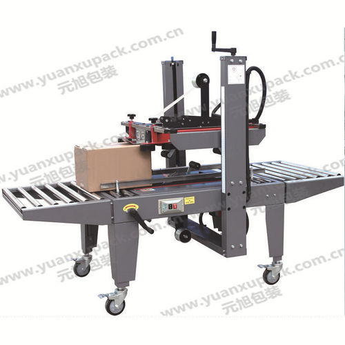 Sigillatrice di cartoni / casse a doppi lembi - YK-07B - Yuanxu Packing(shanghai) Machinery Co., LTD - nastro adesivo / semiautomatica