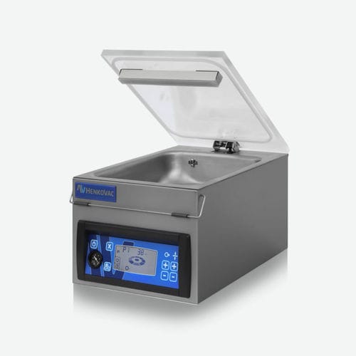Macchina per imballaggio con avanzamento manuale - T2 - Henkovac - sottovuoto / da tavolo / per alimenti