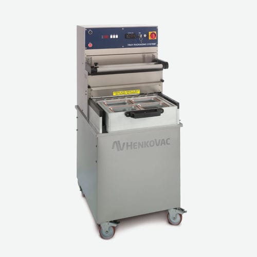 Termosigillatrice di vaschette lineare - TPS XL - Henkovac - automatica / per l'industria agroalimentare / sottovuoto