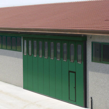 Porta scorrevole verticale - ROTEO GOLD - Ballan Spa - in acciaio galvanizzato / industriale / isolata