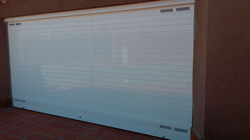 Porta ad avvolgimento - Talleres Alfa Torres - in alluminio / industriale / di sicurezza