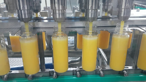 Riempitrice automatica - RM80B - SYNERLINK - per bottiglie / per bottiglie PET / per latticini