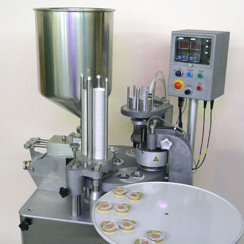 Riempitrice sigillatrice automatica - ALKA-mat 2 - Romer Maschinenbau AG - rotativa / volumetrica / per prodotti alimentari