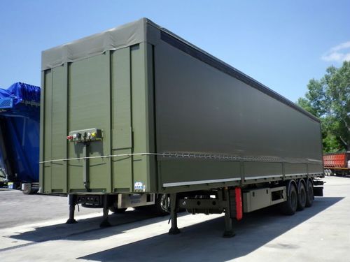 Semirimorchio a pianale - Asso - TECNOKAR TRAILERS SRL - per contenitore / con cassone ribaltabile / a 3 assi