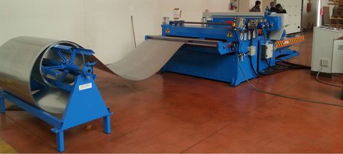 Linea di taglio alimentata a bobina - Omcca S.R.L. - a lama rotativa / per metallo / per punzonatura