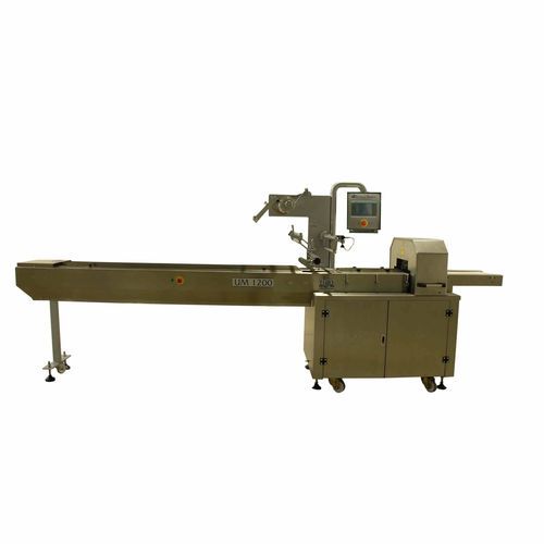 Macchina per imballaggio controllata da PLC - UM 1200 - Uygurlar Makina - orizzontale / per l'industria della panificazione / con trasportatore