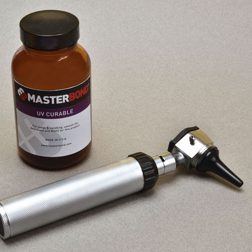 Colla a polimerizzazione UV - UV18S - Master Bond - polimerica / per metallo / per vetro