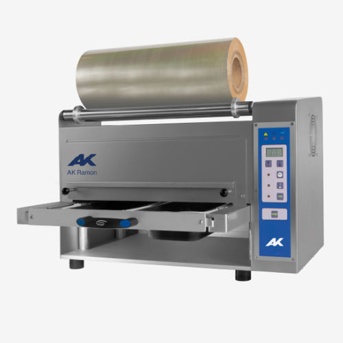 Termosigillatrice di vaschette lineare - TS-200 - TALLERES RAMON, S.L. - semiautomatica / per l'industria agroalimentare / per vaschette