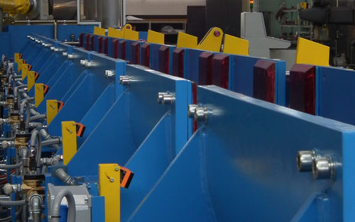 Impianto di movimentazione per officina - Outlet trough V5 hot	 - Cartacci S.r.l. - automatico