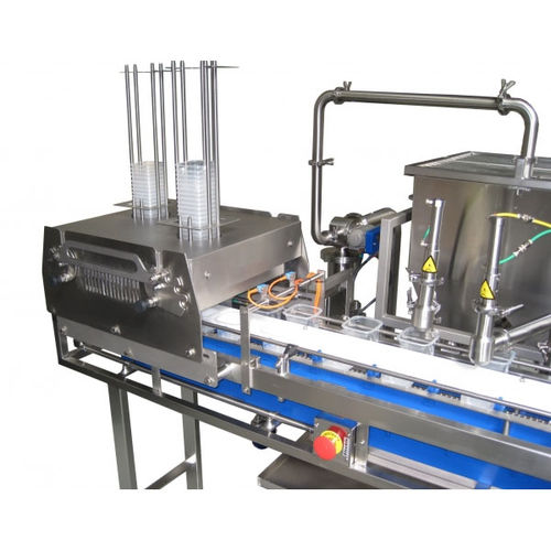 Linea di riempimento automatica - Riggs Auto Pack Ltd - per crema / per alimenti / per liquidi