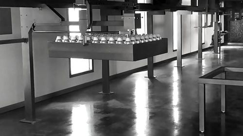 Riempitrice automatizzata - Roxane SAS - per bottiglie / IBC / per bidone
