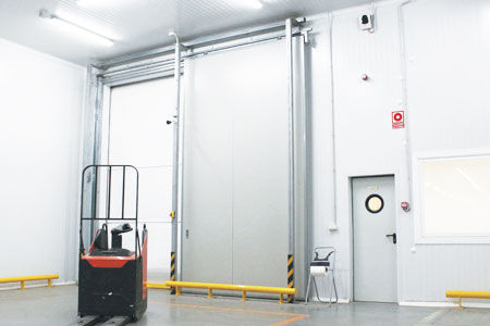 Porta scorrevole verticale - Alapontlogistics - battente / industriale / ignifuga