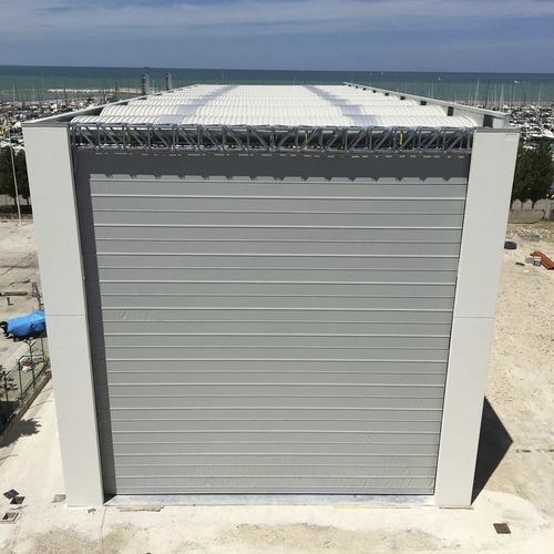 Porta ad impacchettamento - Giga Belt - IPR ITALIA SRL - per interno / per hangar / per miniera
