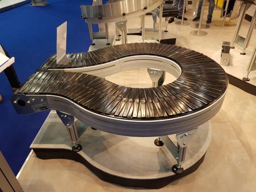 Trasportatore a nastro - AmbaVeyor - AmbaFlex Spiral Conveyor Solutions - a rulli / orizzontale / curvo