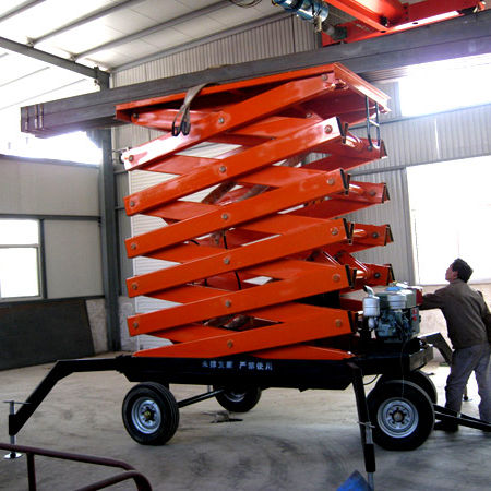 Piattaforma elevatrice a forbice su ruota - a11004 - Jinan Juxin Machinery Co., Ltd. - per uso in interni ed esterni / per cantiere / per applicazioni industriali