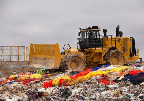 Escavatore intermedio - 836 - Caterpillar Equipment - su ruote / diesel / per discarica di rifiuti