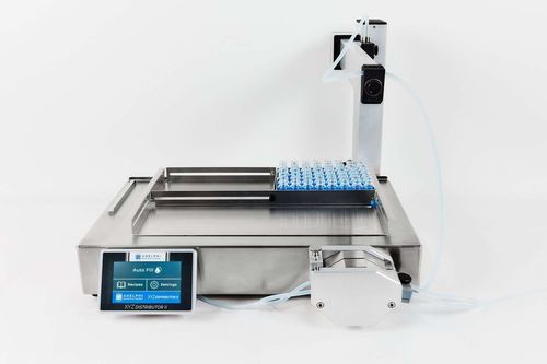 Riempitrice automatizzata - Adelphi - per bottiglie / per prodotti liquidi / per l'industria chimica